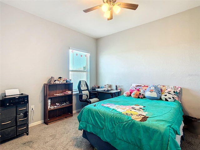 bedroom featuring ceiling fan, carpet, and baseboards