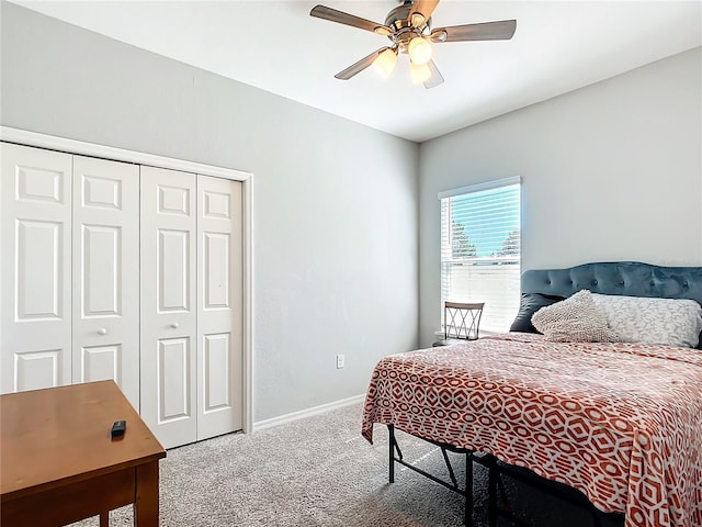 bedroom featuring carpet, a closet, ceiling fan, and baseboards