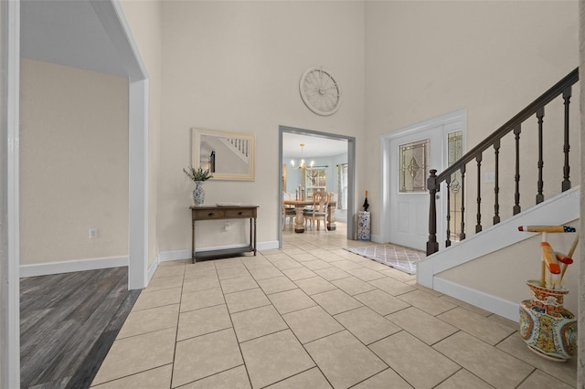 4161 NE 185th Ave, Williston, FL 32696 - tiled foyer with an inviting chandelier and a towering ceiling