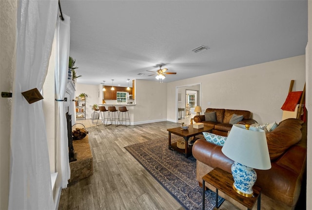 4161 NE 185th Ave, Williston, FL 32696 - living room with hardwood / wood-style flooring and ceiling fan