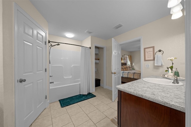 4161 NE 185th Ave, Williston, FL 32696 - bathroom featuring shower / tub combo, vanity, and tile patterned floors