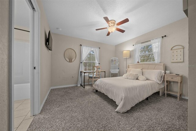 4161 NE 185th Ave, Williston, FL 32696 - tiled bedroom featuring a textured ceiling and ceiling fan
