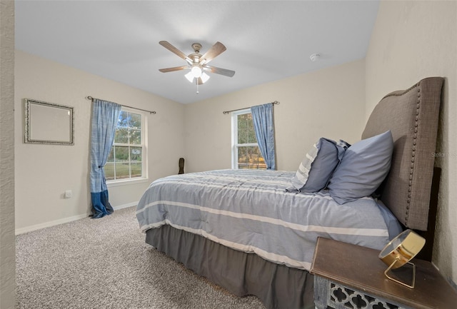 4161 NE 185th Ave, Williston, FL 32696 - bedroom with multiple windows, light carpet, and ceiling fan