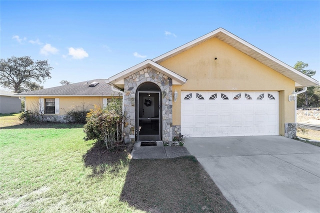 single story home featuring a garage and a front yard