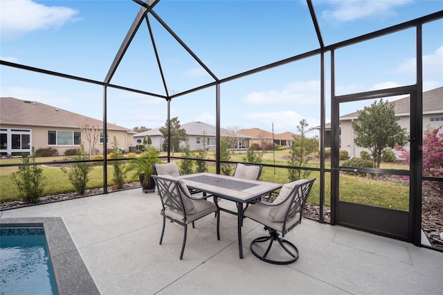 unfurnished sunroom with a residential view