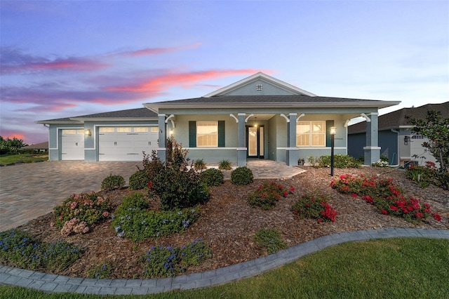8107 SW 92nd Cir, Ocala, FL 34481 - ranch-style house with covered porch, stucco siding, a garage, and driveway