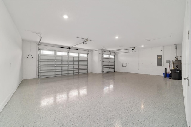 8107 SW 92nd Cir, Ocala, FL 34481 - garage featuring electric panel, recessed lighting, and a garage door opener
