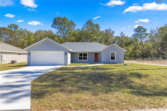 ranch-style home with a front yard and a garage