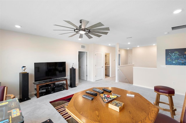 living room with visible vents, baseboards, light colored carpet, ceiling fan, and recessed lighting