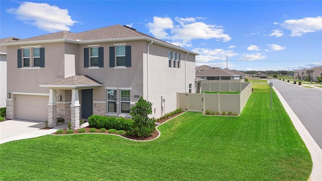 8953 SW 50th Ter, Ocala, FL 34476 - view of front of property with concrete driveway, stucco siding, fence, an attached garage, and a front yard