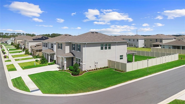8953 SW 50th Ter, Ocala, FL 34476 - view of property exterior featuring stucco siding, fence, an attached garage, a residential view, and a yard
