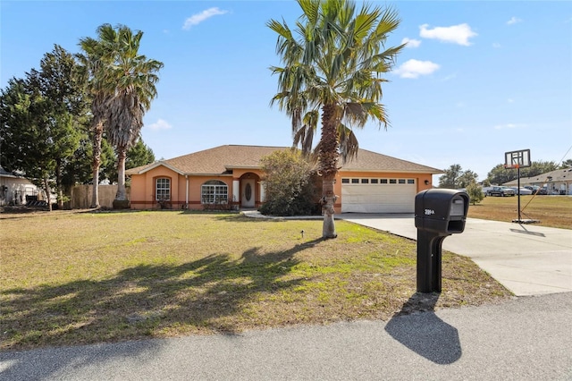 ranch-style home with a garage and a front lawn