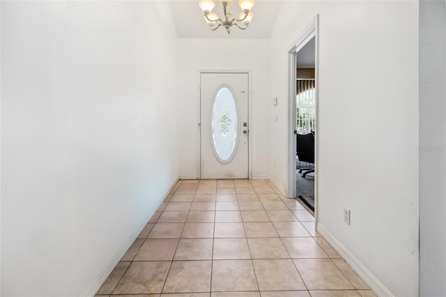 interior space featuring a chandelier and light tile patterned flooring