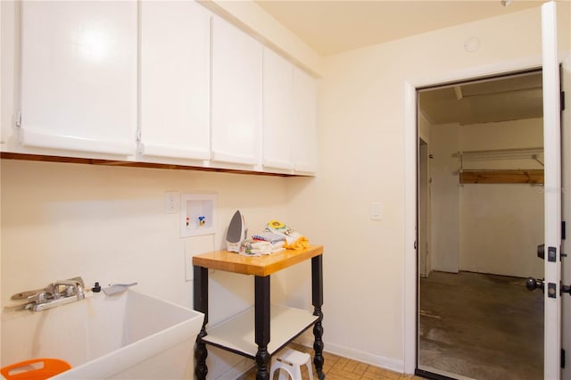 laundry room with washer hookup and a sink