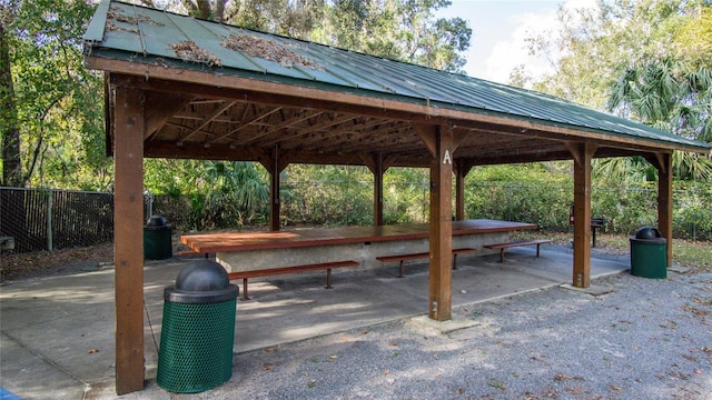 view of home's community with fence and a gazebo