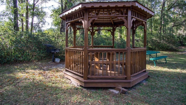 deck featuring a yard and a gazebo