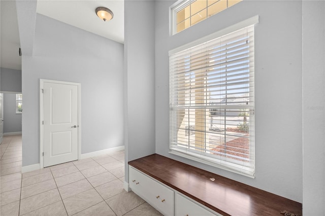 interior space featuring light tile patterned floors