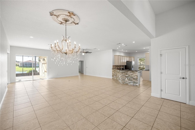 10138 Lake Miona Way, Oxford, FL 34484 - unfurnished living room featuring a chandelier, light tile patterned floors, and recessed lighting