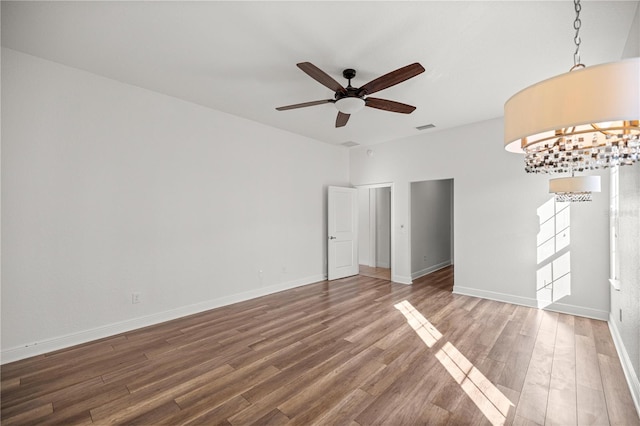 10138 Lake Miona Way, Oxford, FL 34484 - unfurnished room with ceiling fan and wood finished floors