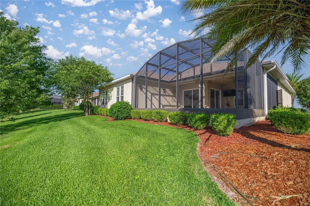10138 Lake Miona Way, Oxford, FL 34484 - view of grassy yard with glass enclosure and ceiling fan