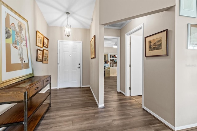 entrance foyer with dark hardwood / wood-style flooring