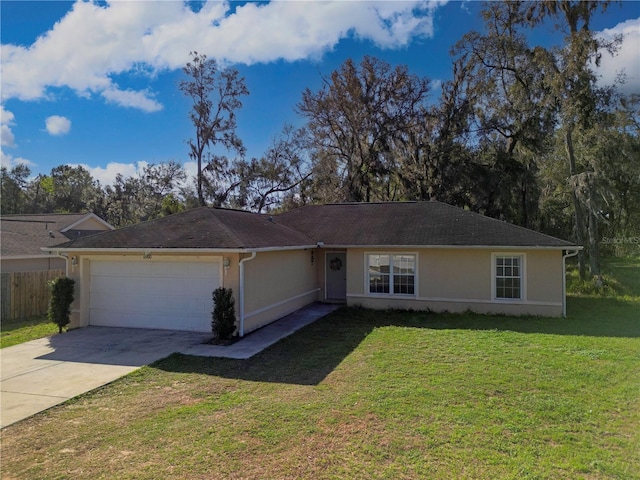 ranch-style home featuring a front lawn and a garage