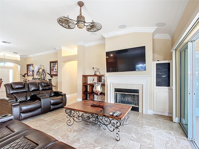 7688 SE 135th St, Summerfield, FL 34491 - living room with ornamental molding and a fireplace
