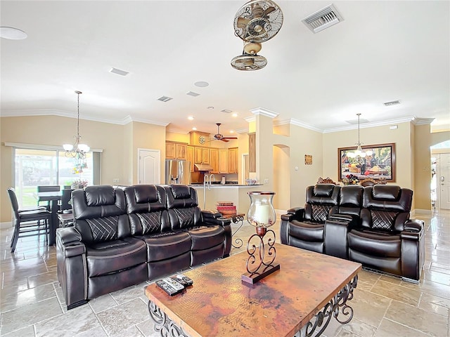 7688 SE 135th St, Summerfield, FL 34491 - living room featuring ornamental molding and ceiling fan with notable chandelier