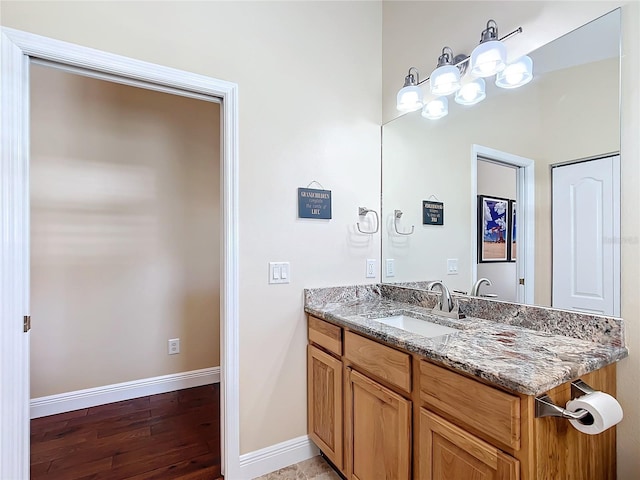 7688 SE 135th St, Summerfield, FL 34491 - bathroom with hardwood / wood-style flooring and vanity