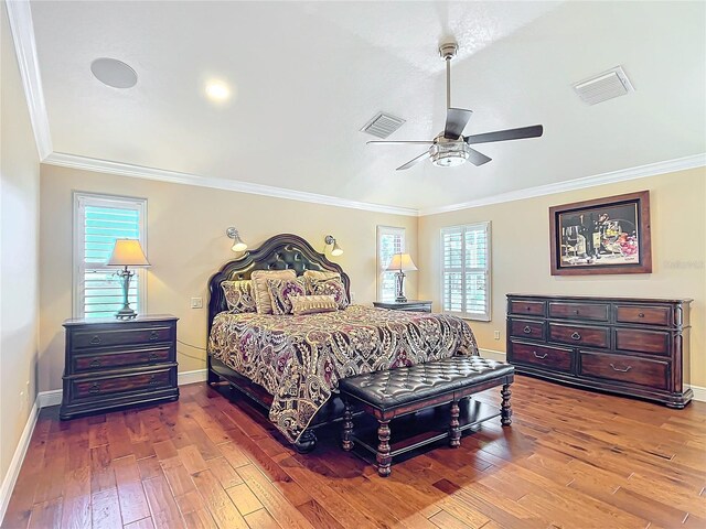 7688 SE 135th St, Summerfield, FL 34491 - bedroom with multiple windows, crown molding, wood-type flooring, and ceiling fan