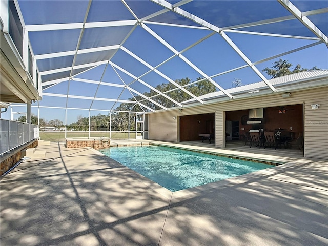 7688 SE 135th St, Summerfield, FL 34491 - view of pool with a patio area, ceiling fan, and glass enclosure
