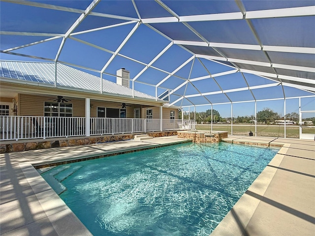 7688 SE 135th St, Summerfield, FL 34491 - view of pool with an in ground hot tub, ceiling fan, a patio, and glass enclosure
