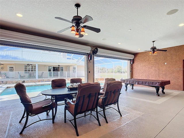 7688 SE 135th St, Summerfield, FL 34491 - view of patio featuring ceiling fan and glass enclosure