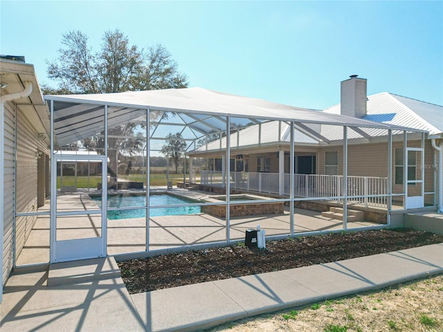 7688 SE 135th St, Summerfield, FL 34491 - view of swimming pool featuring a lanai and a patio area