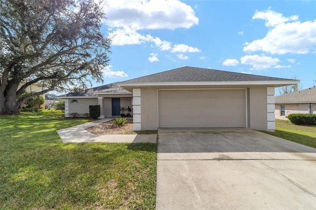 view of front of home featuring a garage and a front yard