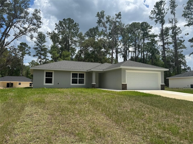 9971 N Bamboo Way, Citrus Springs, FL 34434 - view of front facade with an attached garage, stucco siding, concrete driveway, and a front yard