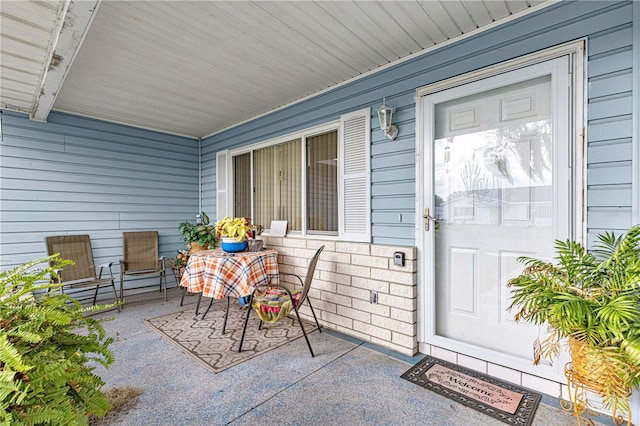 entrance to property with covered porch