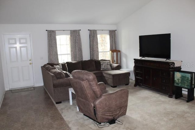 living room with lofted ceiling and light carpet