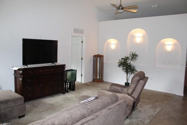 living room featuring high vaulted ceiling and ceiling fan