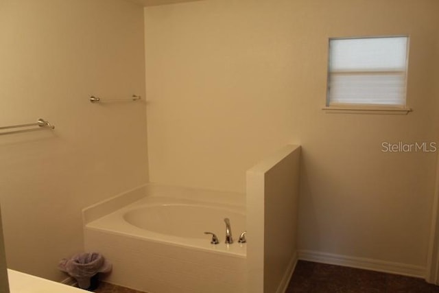 bathroom with a bath