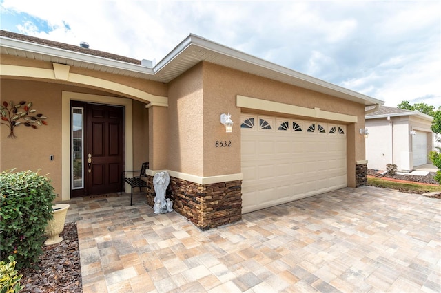 view of front of property featuring a garage