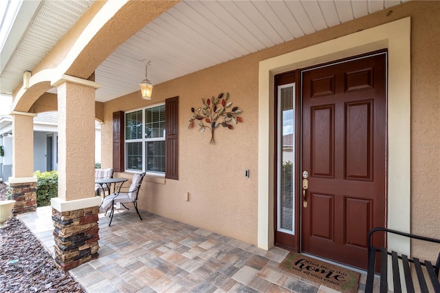 property entrance with a porch