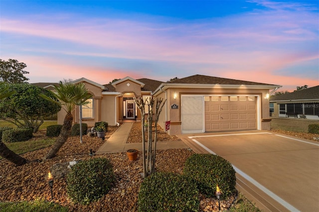 single story home with a garage