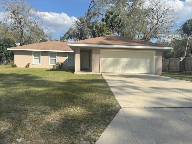 ranch-style home featuring a garage and a front lawn