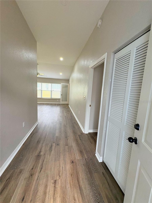 hall with dark hardwood / wood-style floors