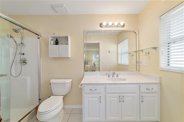 bathroom featuring visible vents, toilet, tile patterned flooring, vanity, and a shower stall