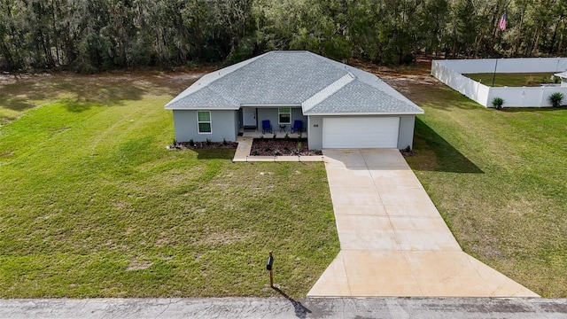 view of front of home with a garage, a front lawn, and a porch