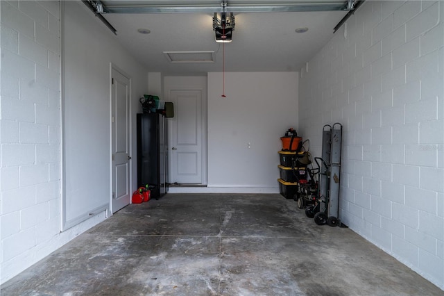 garage featuring a garage door opener