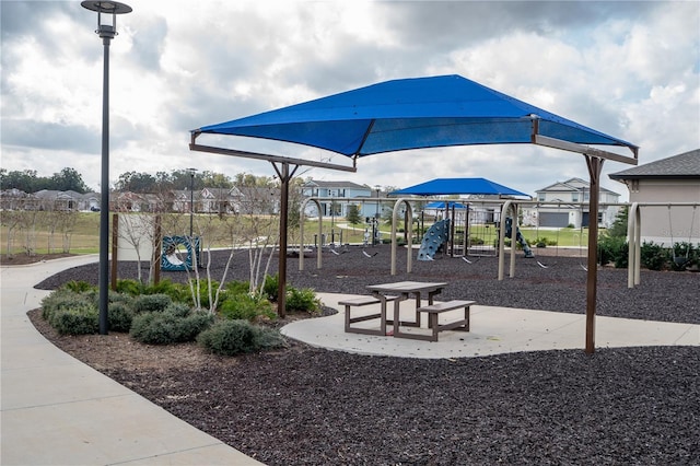 view of home's community featuring a playground