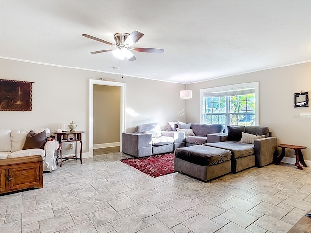 living room with ceiling fan and ornamental molding